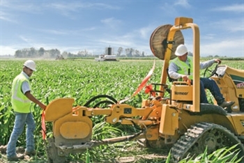 Farmer and machinery 