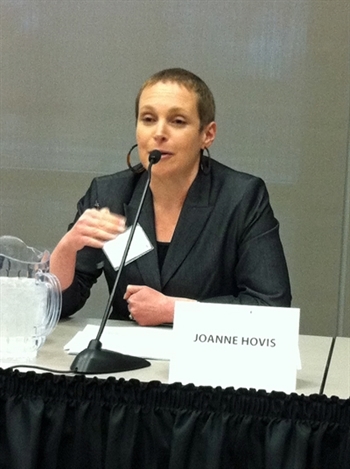 Joanne Hovis speaks to the crowd in Naperville